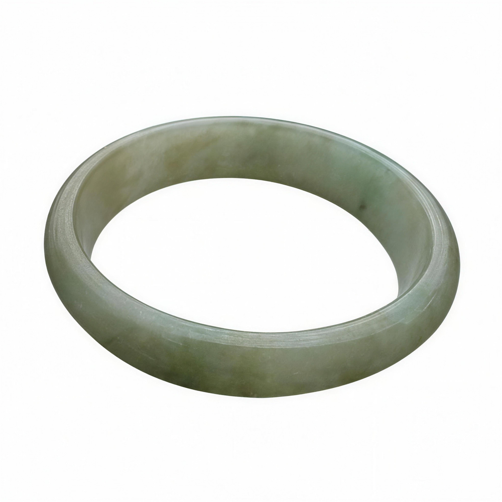 Certified Burmese jadeite bangle, 48.7g, with soft celadon luster on ivory background